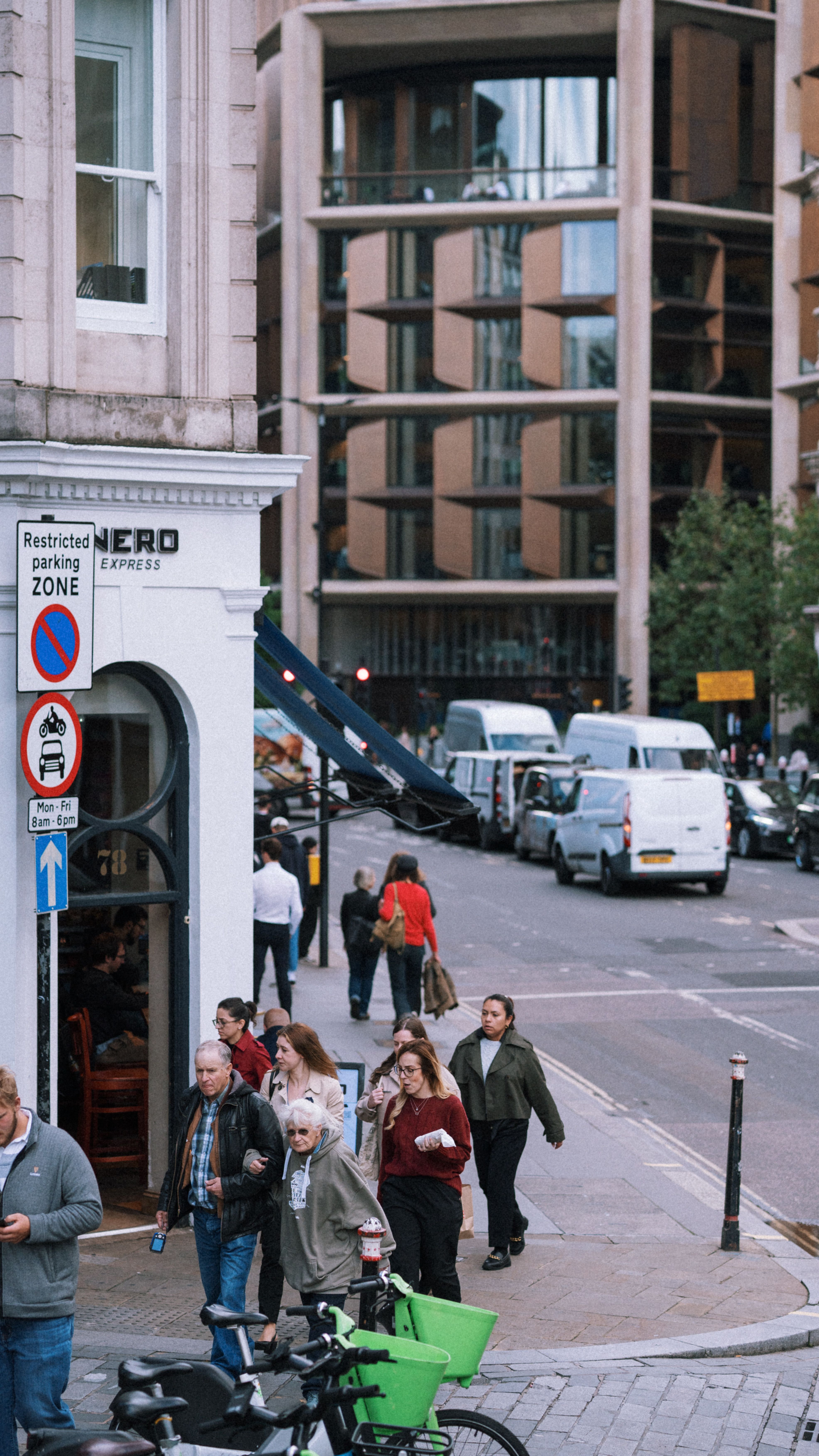 Busy Urban Street Scene in Modern Cityscape · Free Stock Photo