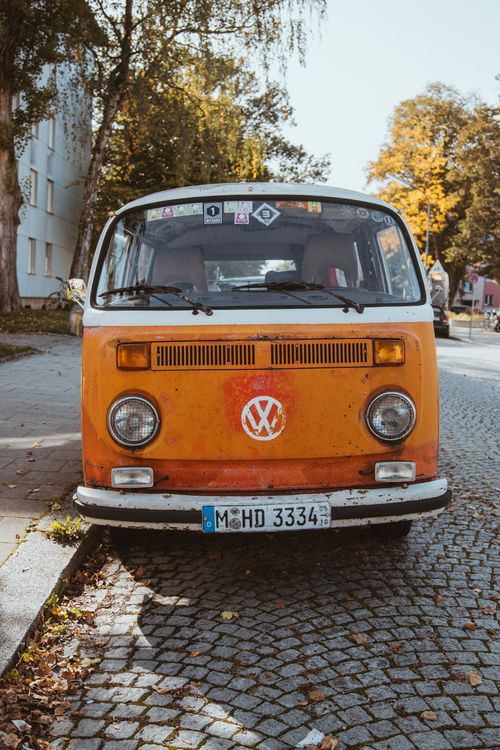 Free A classic Volkswagen van parked on a cobblestone street in München, Germany. Stock Photo