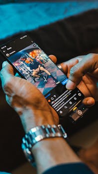 Close-up of hands browsing Instagram on smartphone with social media icons visible.