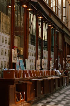 Explore a quaint bookshop in a classic Paris passageway with vintage allure.