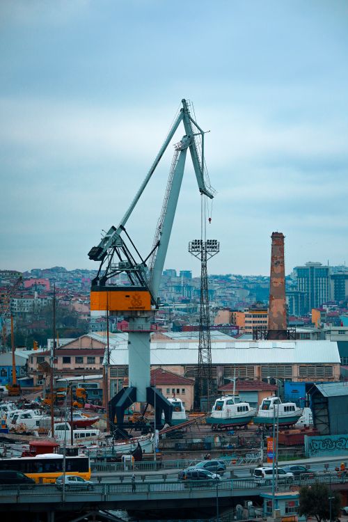 Free A large industrial crane towering over the cityscape in Istanbul, showcasing urban and architectural development. Stock Photo