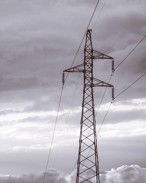 High Voltage Power Lines Against Cloudy Sky · Free Stock Photo