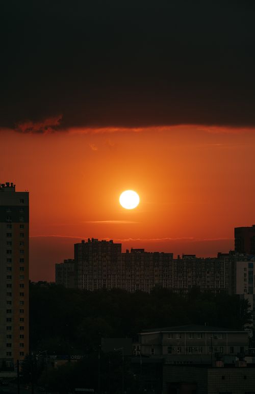 Free Breathtaking view of the sunset over the Minsk skyline, casting warm hues. Stock Photo