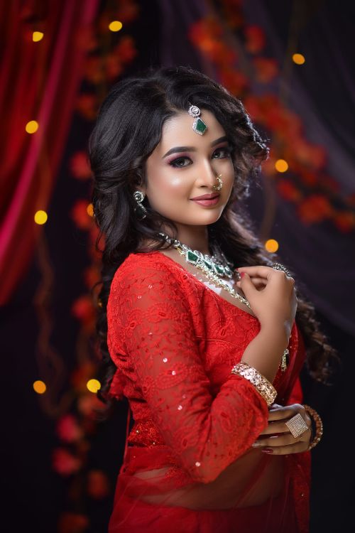 Elegant Portrait of a Woman in Red Traditional Attire · Free Stock Photo