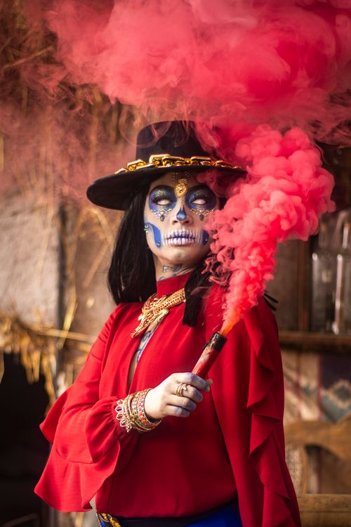 Free Colorful Day of the Dead attire with smoke effect, perfect for festive themes. Stock Photo