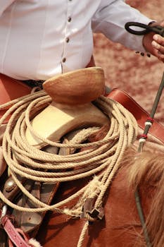 Detailed view of charro saddle and lasso in Mexican rodeo, Tolcayuca, Mexico.