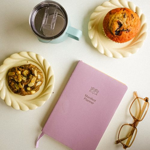 Linen-bound planner in a morning flat lay — photo by Angel Dim on Pexels
