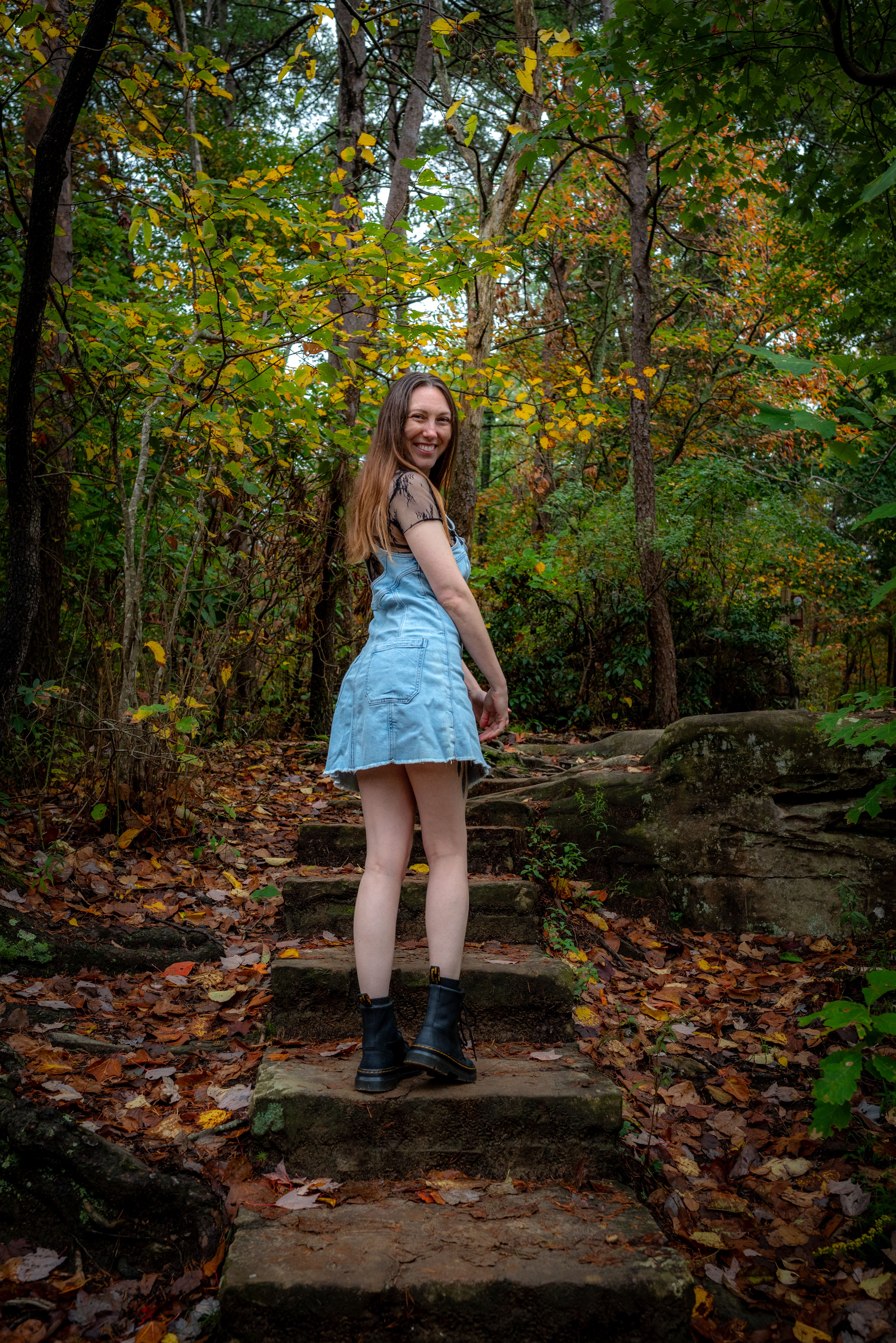 Young Woman Strolling in Autumn Forest · Free Stock Photo