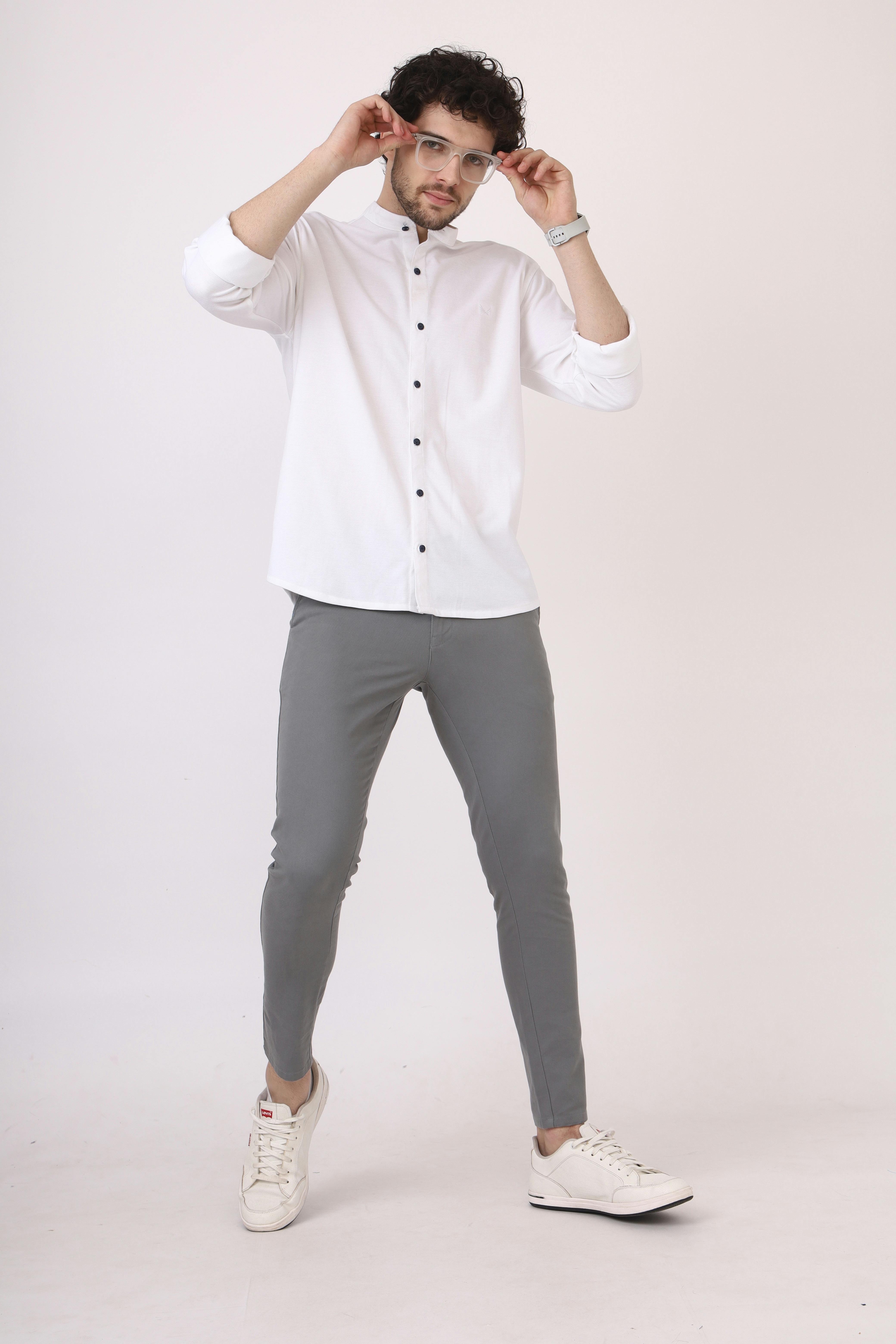 Miễn phí Người đàn ông Phong Cách Tạo Dáng Trong Trang Phục Giản Dị Thông Minh Ảnh lưu trữ