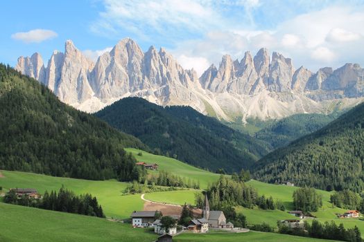 Breathtaking view of Santa Magdalena village and Dolomites in Italy's Trentino-Alto Adige region.