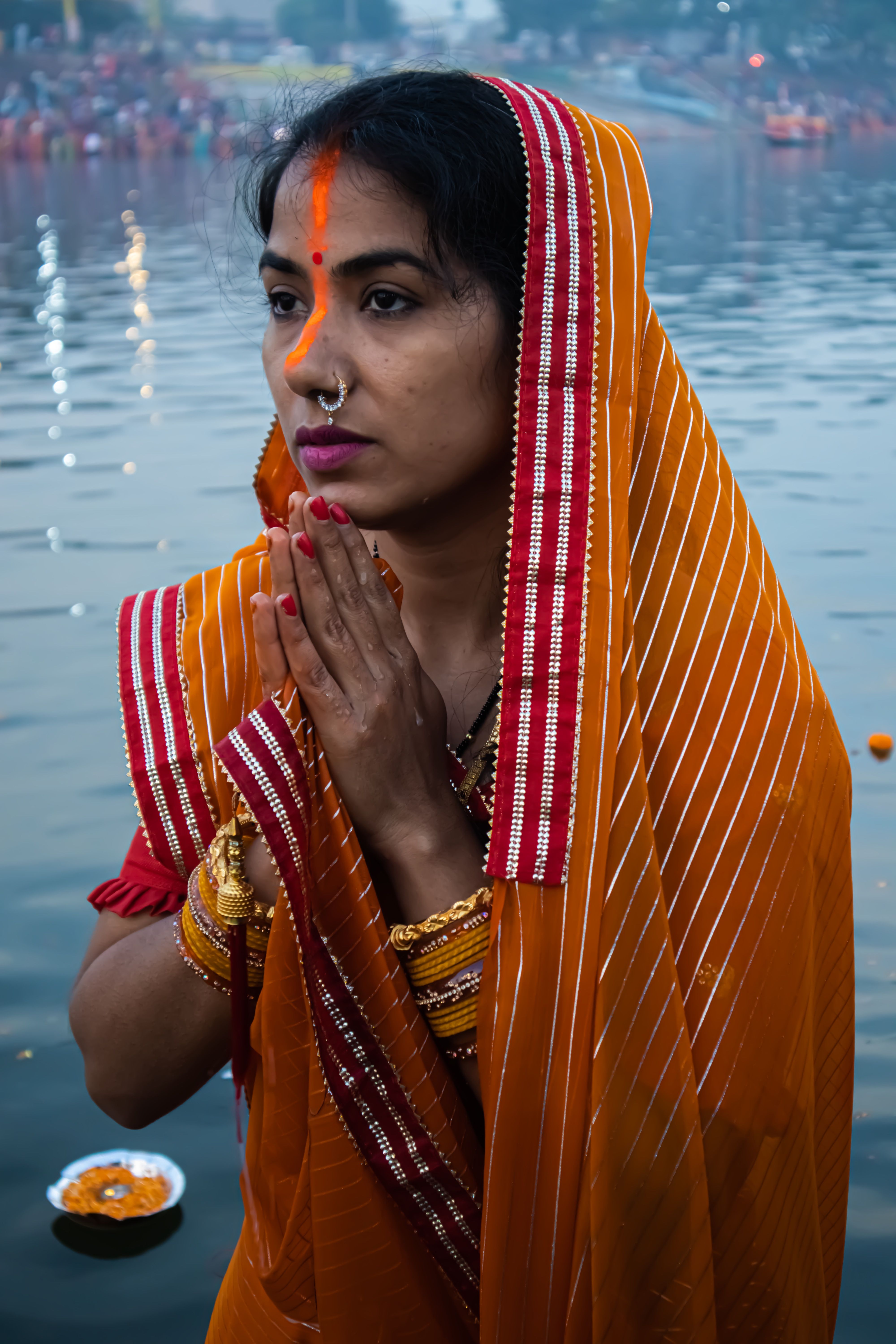 Indian Woman in Traditional Dress Performing Ritual · Free Stock Photo