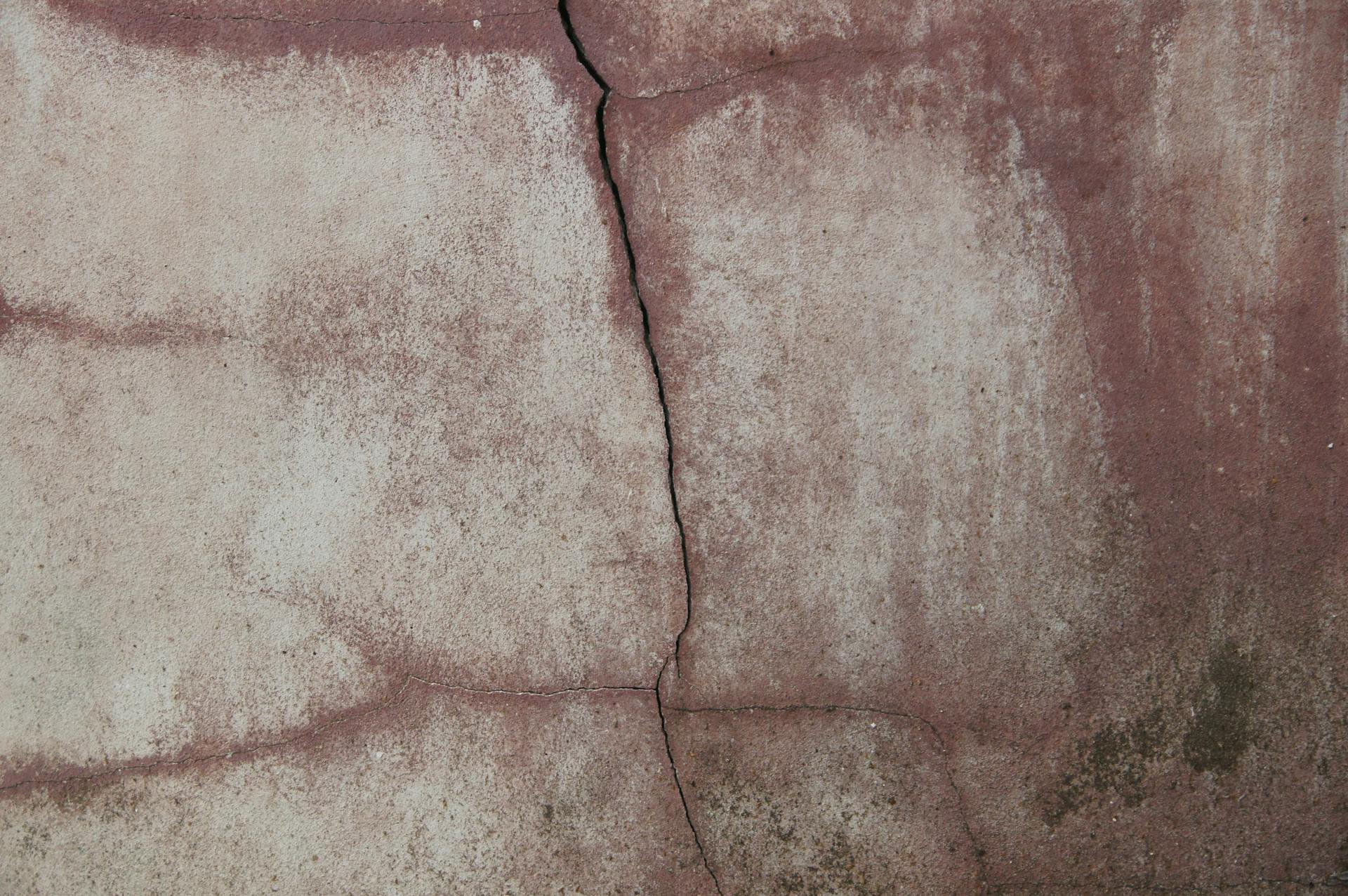 Cracked Concrete Textured Wall Surface