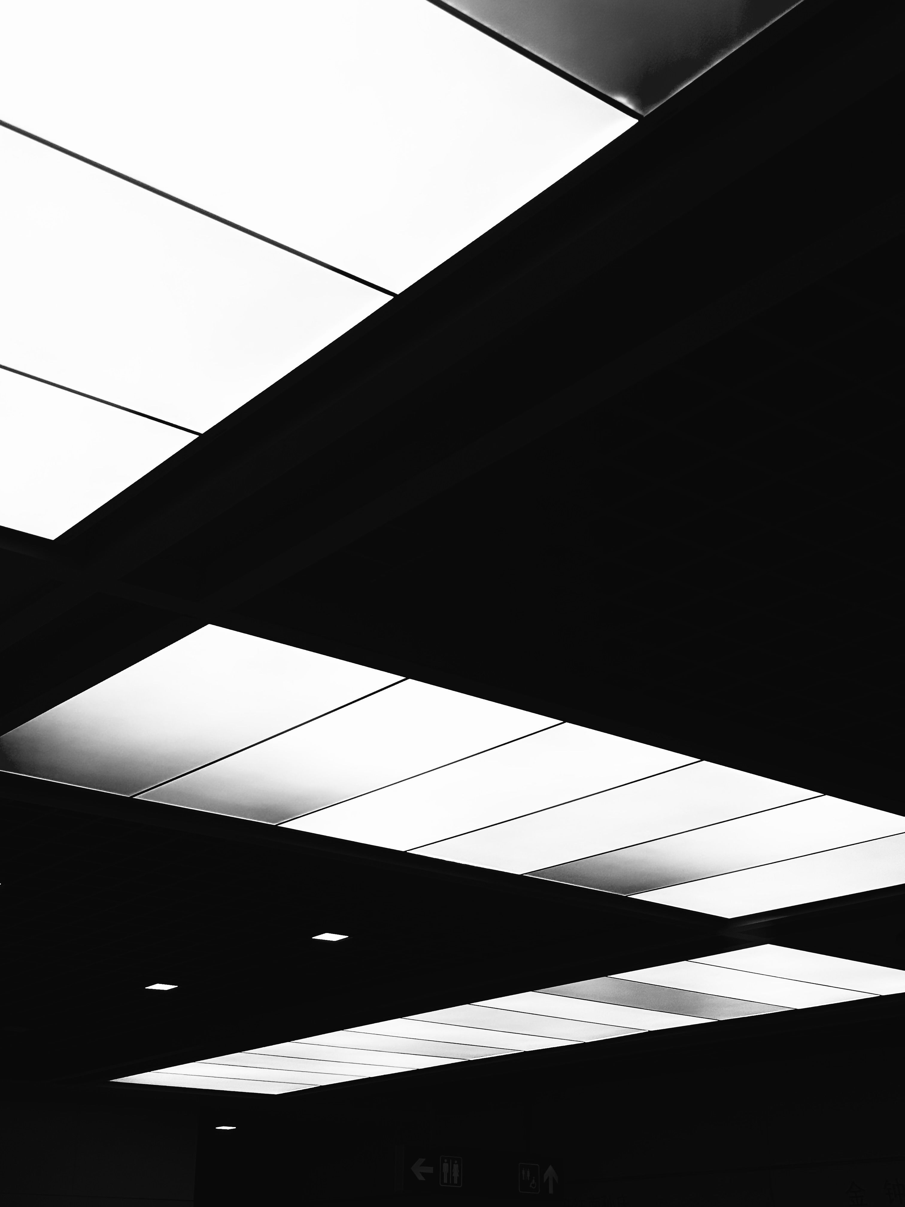 Modern Architectural Ceiling with Geometric Light Panels · Free Stock Photo