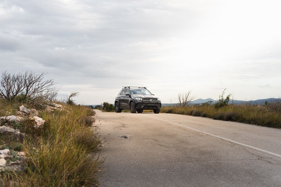 SUV travelling on a scenic mountain road