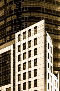 Dynamic angles of a modern building showcasing geometric patterns and reflections.