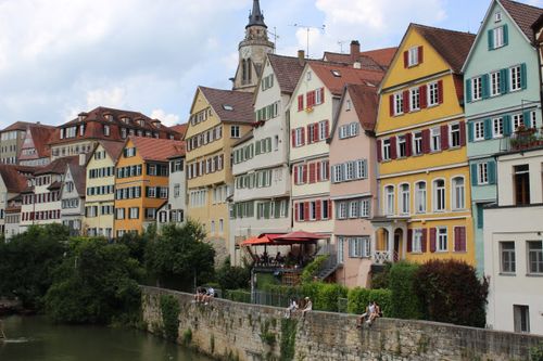 Free Scenic view of Tübingen's vibrant historic houses alongside the Neckar river in Germany. Stock Photo