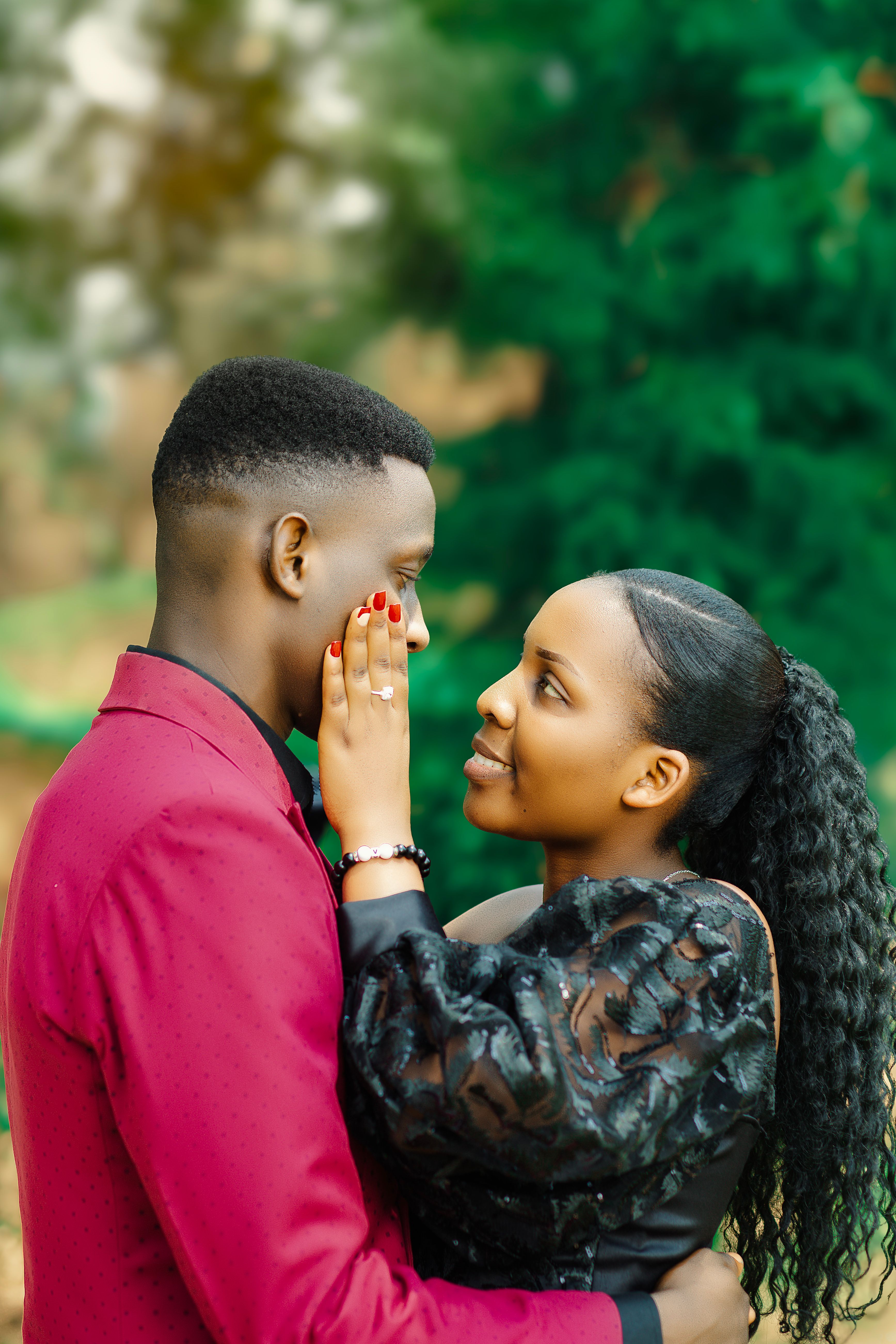 Romantic Couple Embracing Outdoors · Free Stock Photo