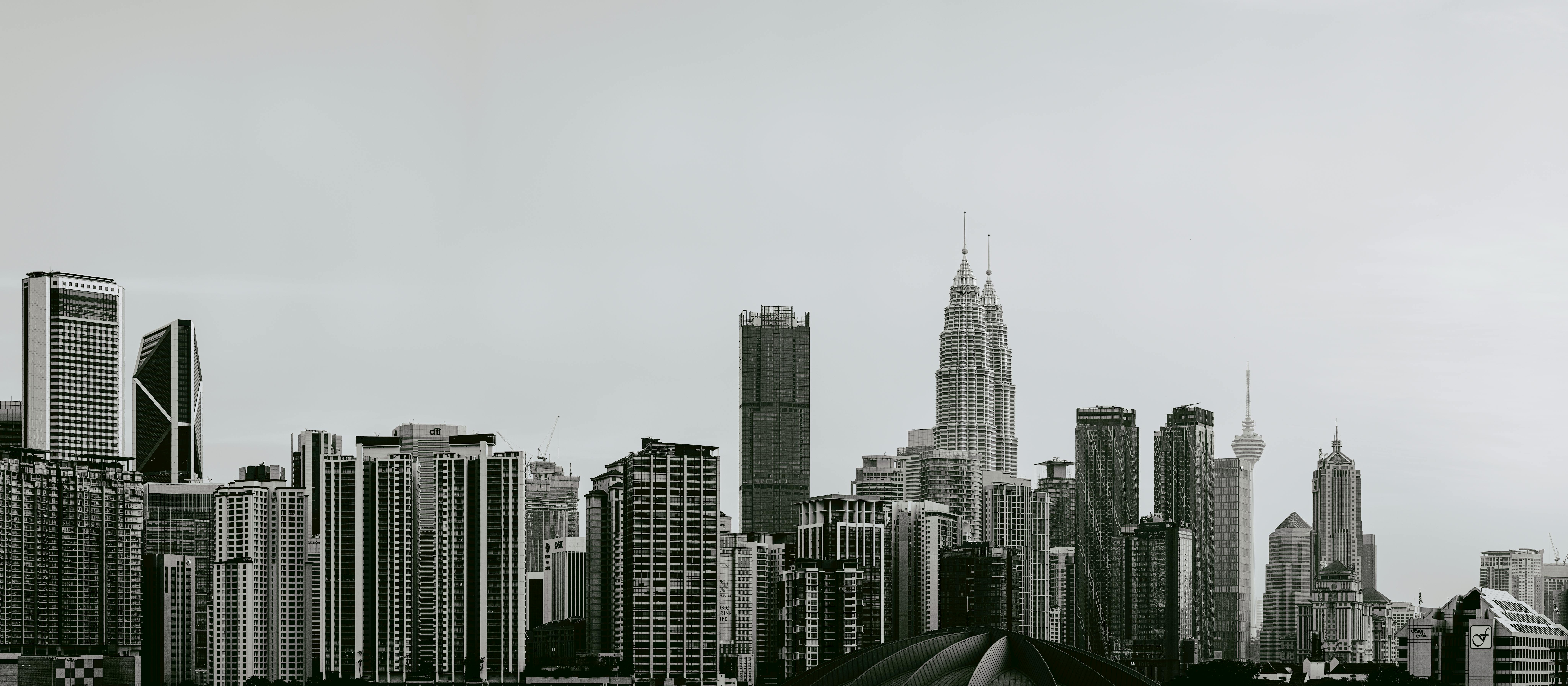 Gray scale Photo of Highrise Buildings · Free Stock Photo