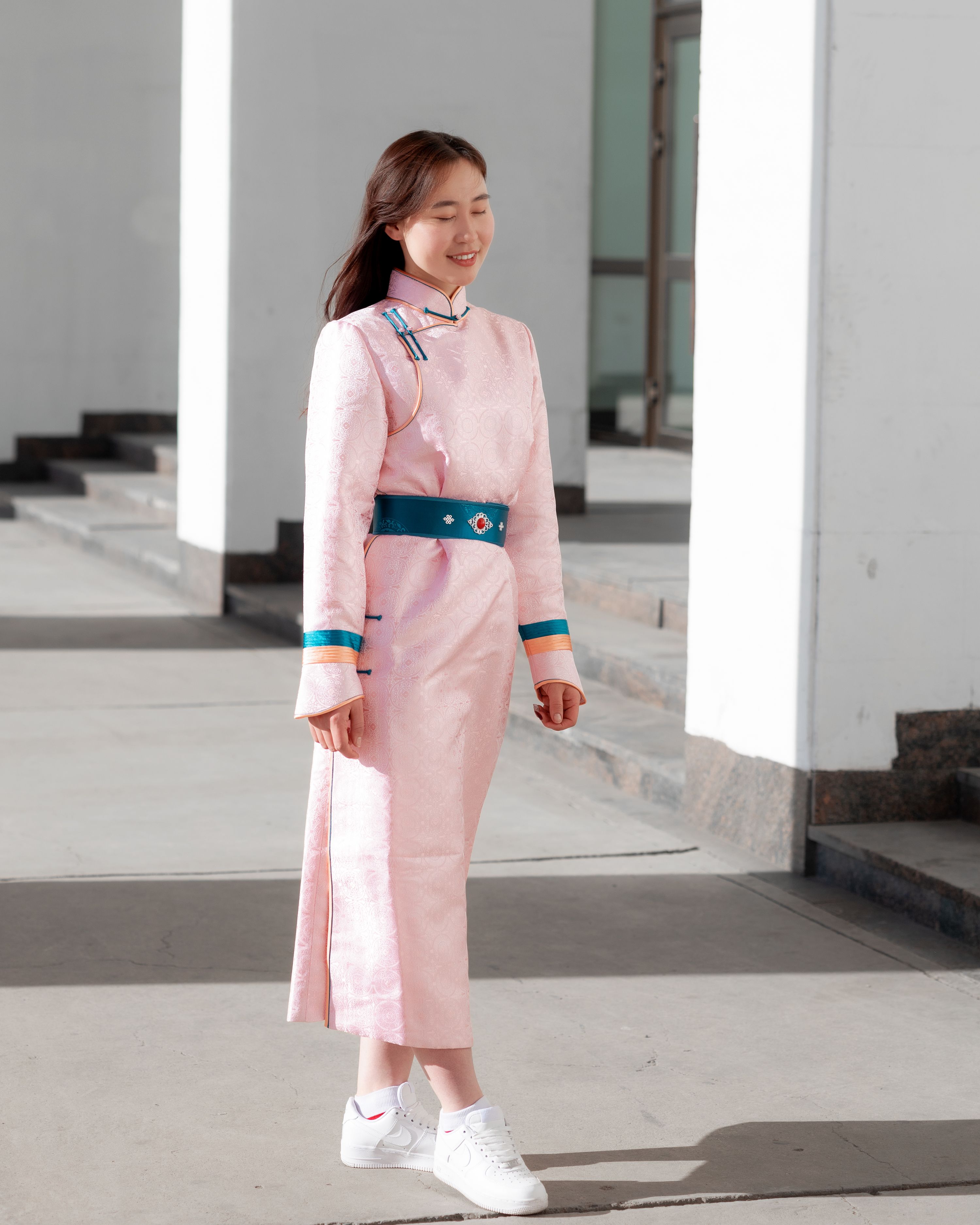 Young Woman in Traditional Mongolian Dress Outdoors · Free Stock Photo