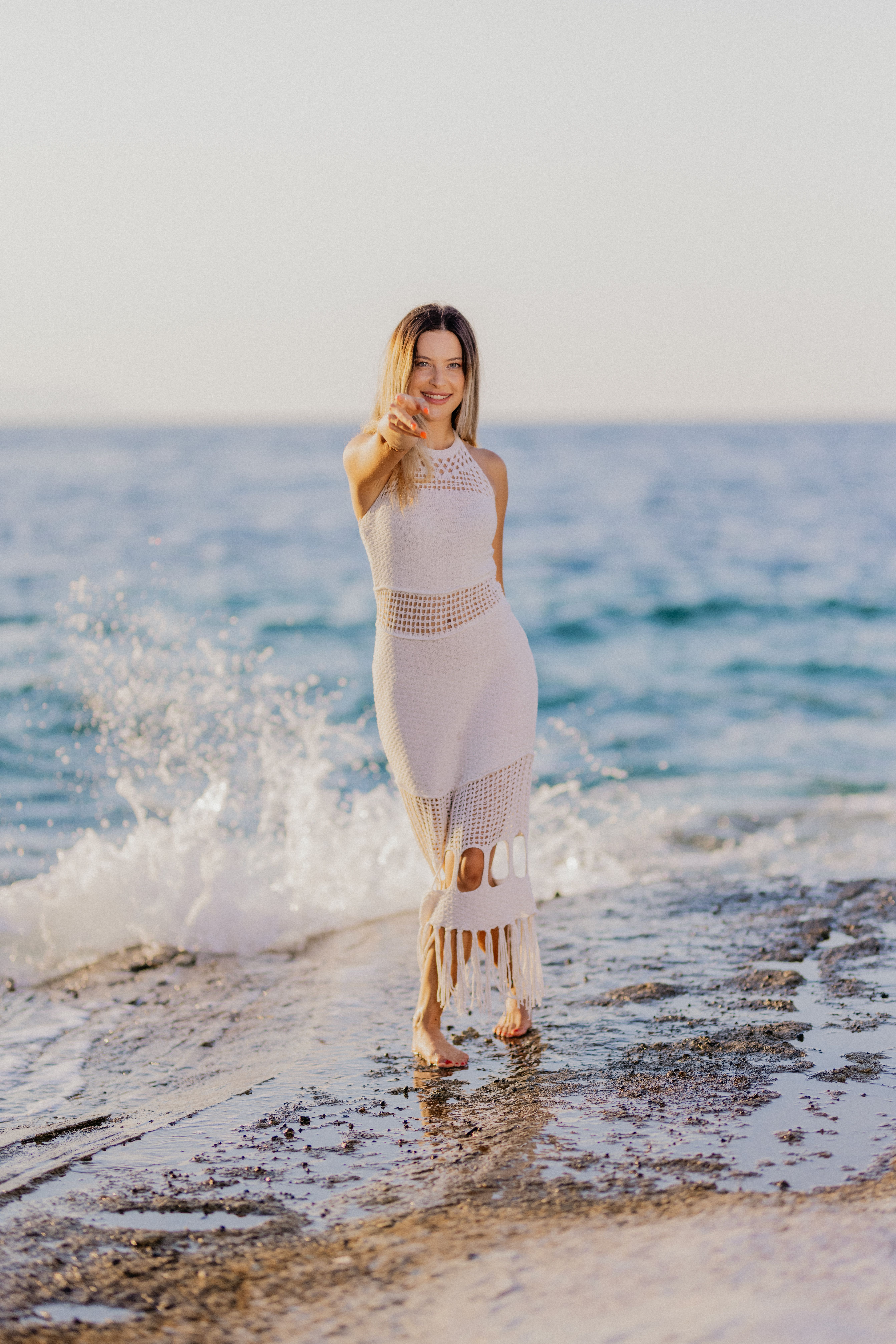 Young Woman in White Dress by the Sea · Free Stock Photo