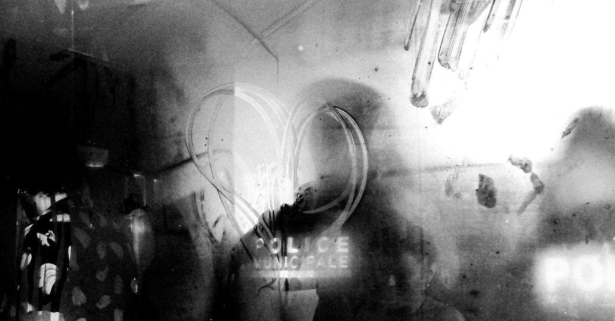 Police Reflection Artistic Black and White Police Reflection in Arles · Free Stock Photo