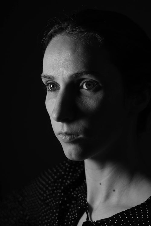 Free A striking black and white portrait highlighting a woman's contemplative expression. Stock Photo