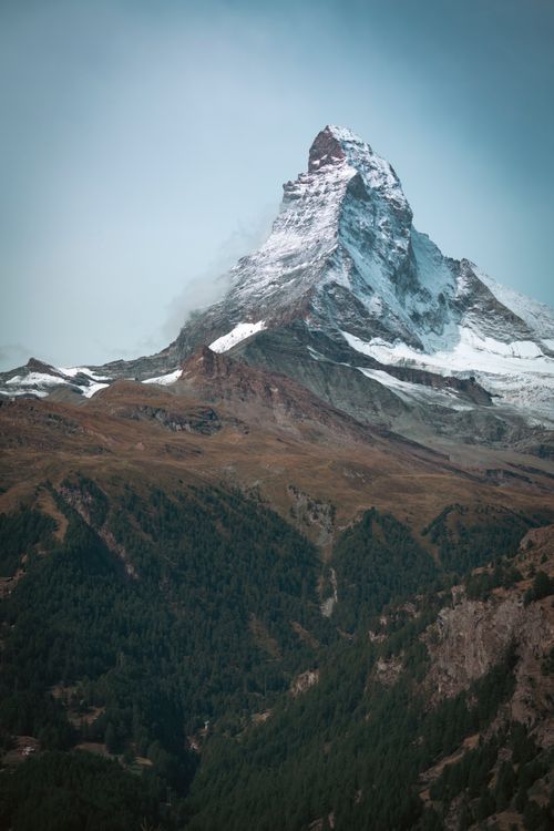 Free Breathtaking capture of the snow-capped Matterhorn peak during daytime in Switzerland. Perfect for nature enthusiasts. Stock Photo