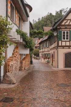 Picturesque cobblestone street with traditional German houses in Triberg.