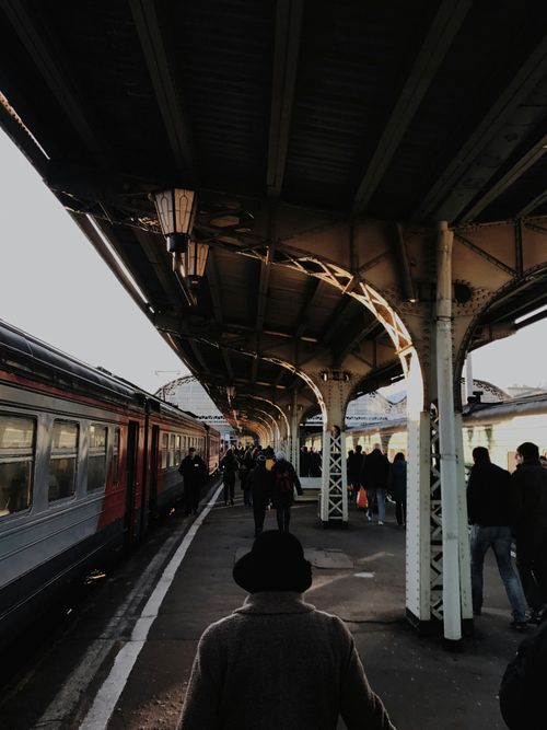 Free Urban scene at a train station in Saint Petersburg, Russia, with people walking and boarding. Stock Photo