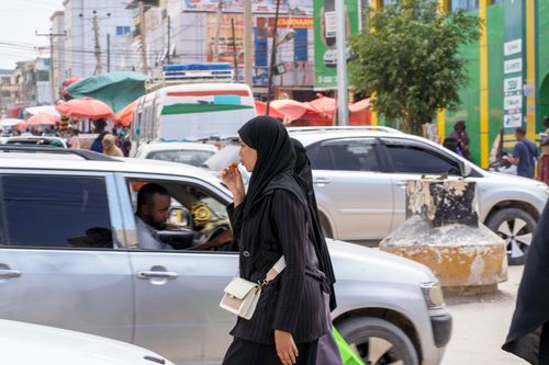 Free Somali girl on her way  Stock Photo