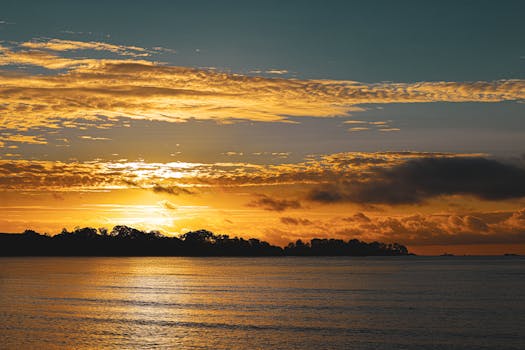 Breathtaking sunrise over the serene waters at Cove Island Park, Stamford, CT.