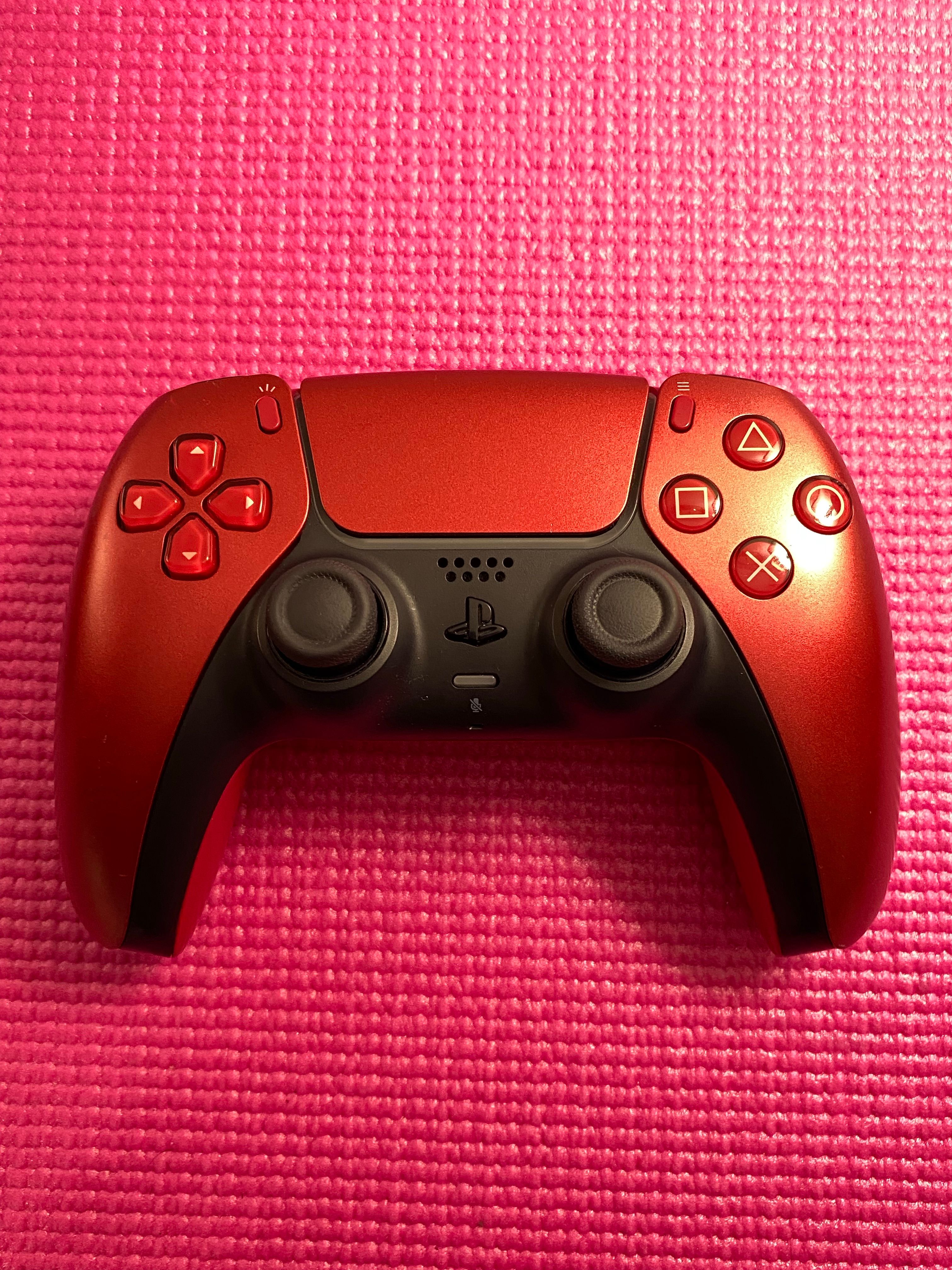 Red Gaming Controller on Pink Background · Free Stock Photo