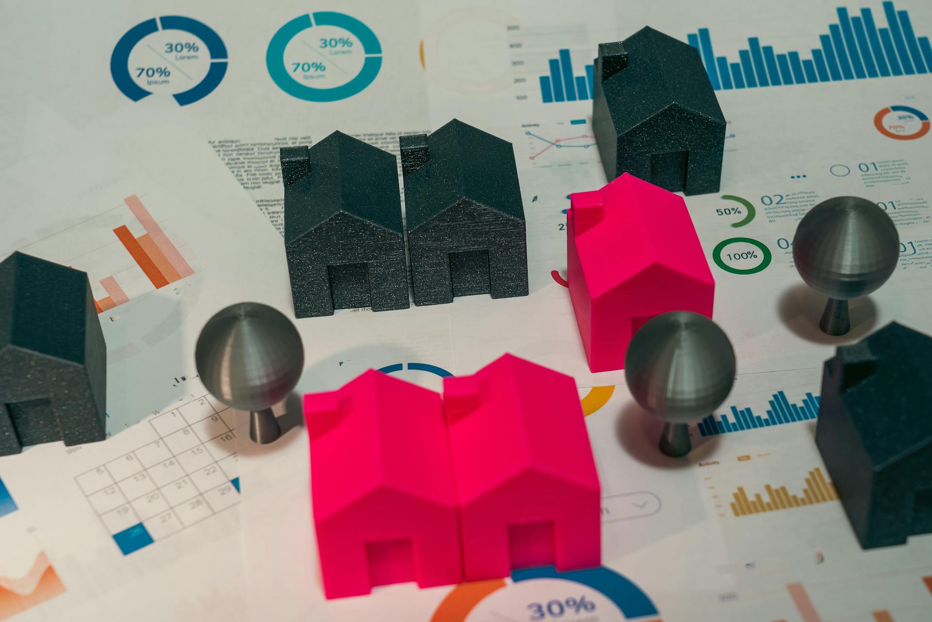 Colorful Model Houses on Financial Charts