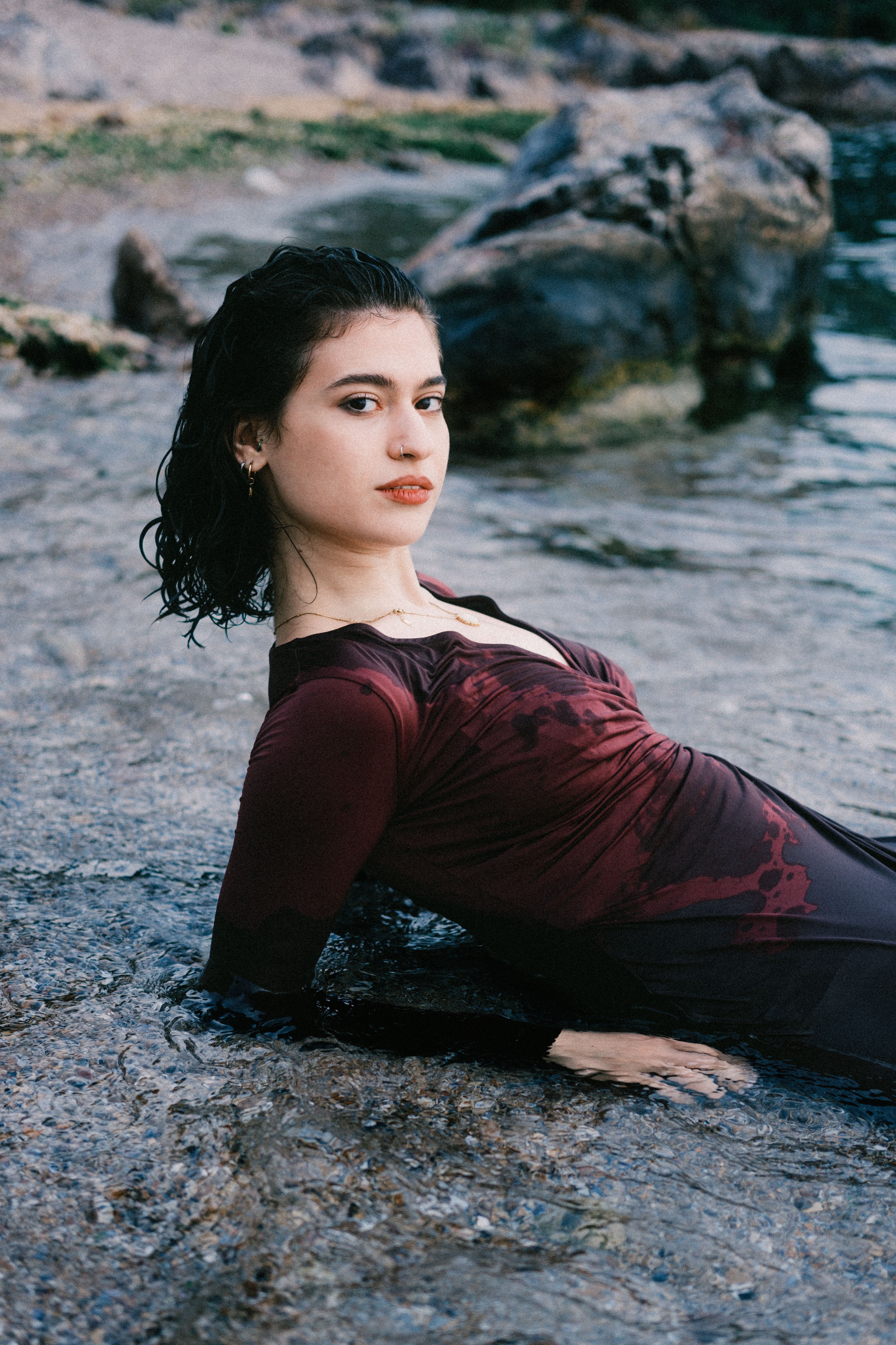 Woman in Elegant Dress Relaxing in Water · Free Stock Photo