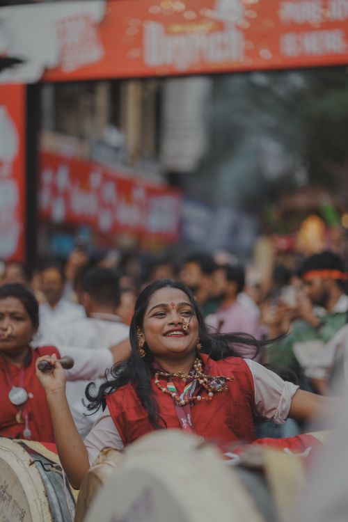Free Vibrant street scene during Ganesh Chaturthi festival in Pune, India. Stock Photo