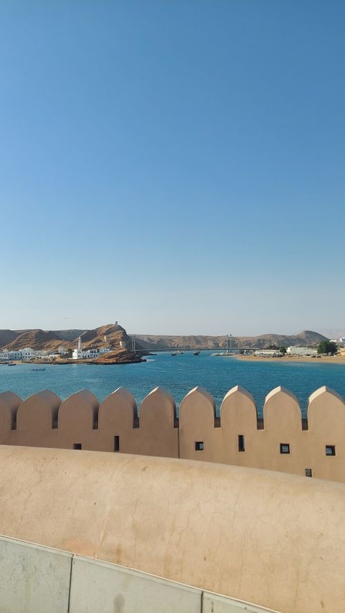 Free Beautiful coastal view of Muscat, Oman with the fort wall and ocean landscape. Stock Photo