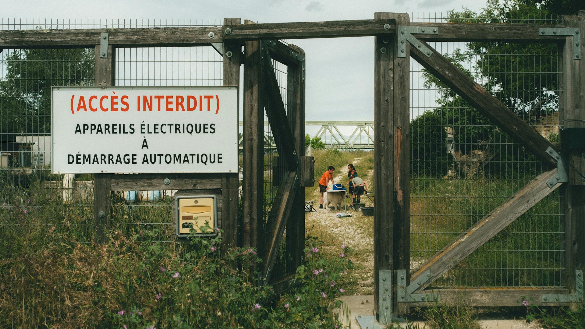 Restricted Access Sign at Open Gate