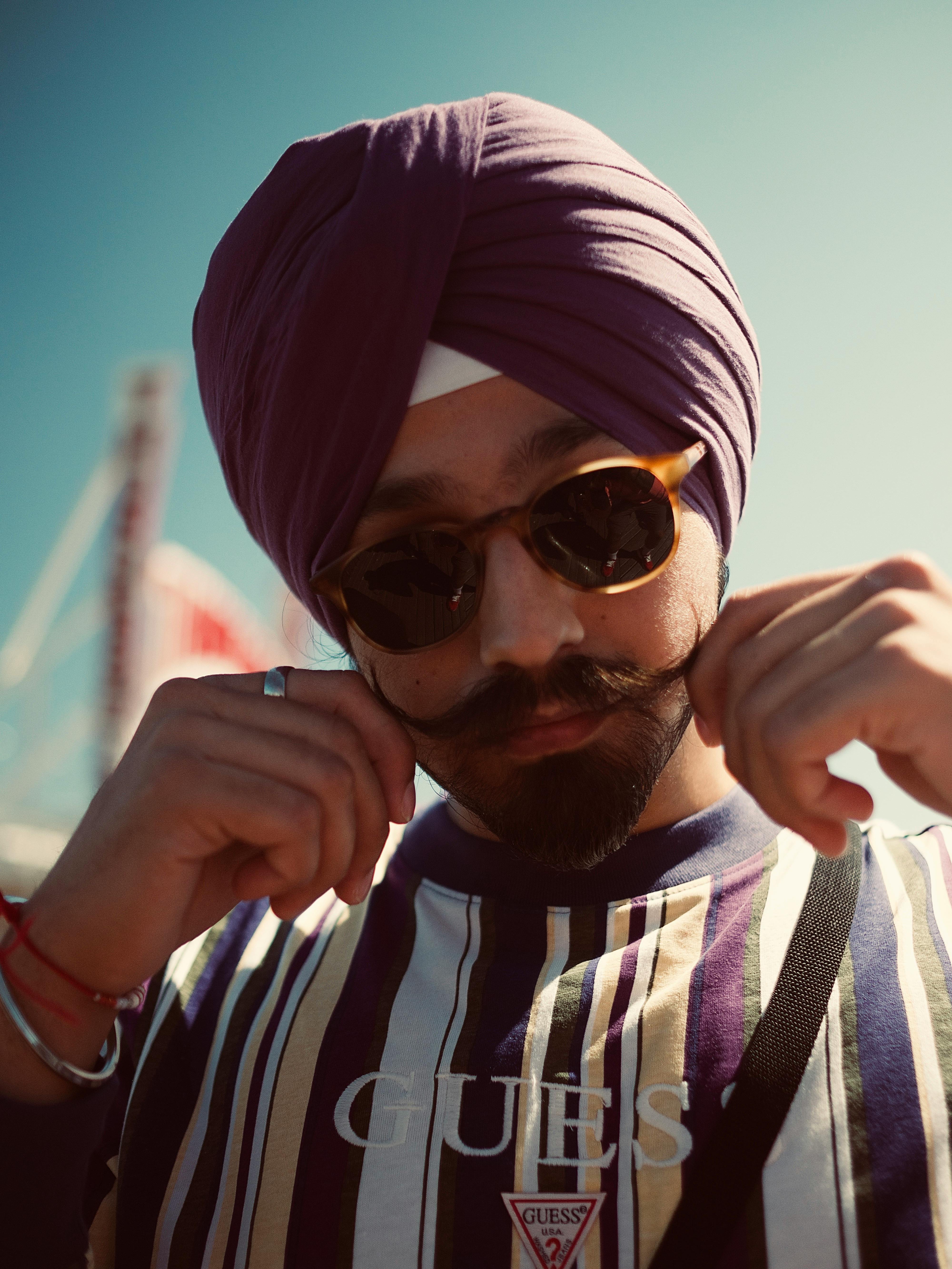 Free: Man Wearing Purple Turban and Black Clubmaster Sunglasses - nohat.cc