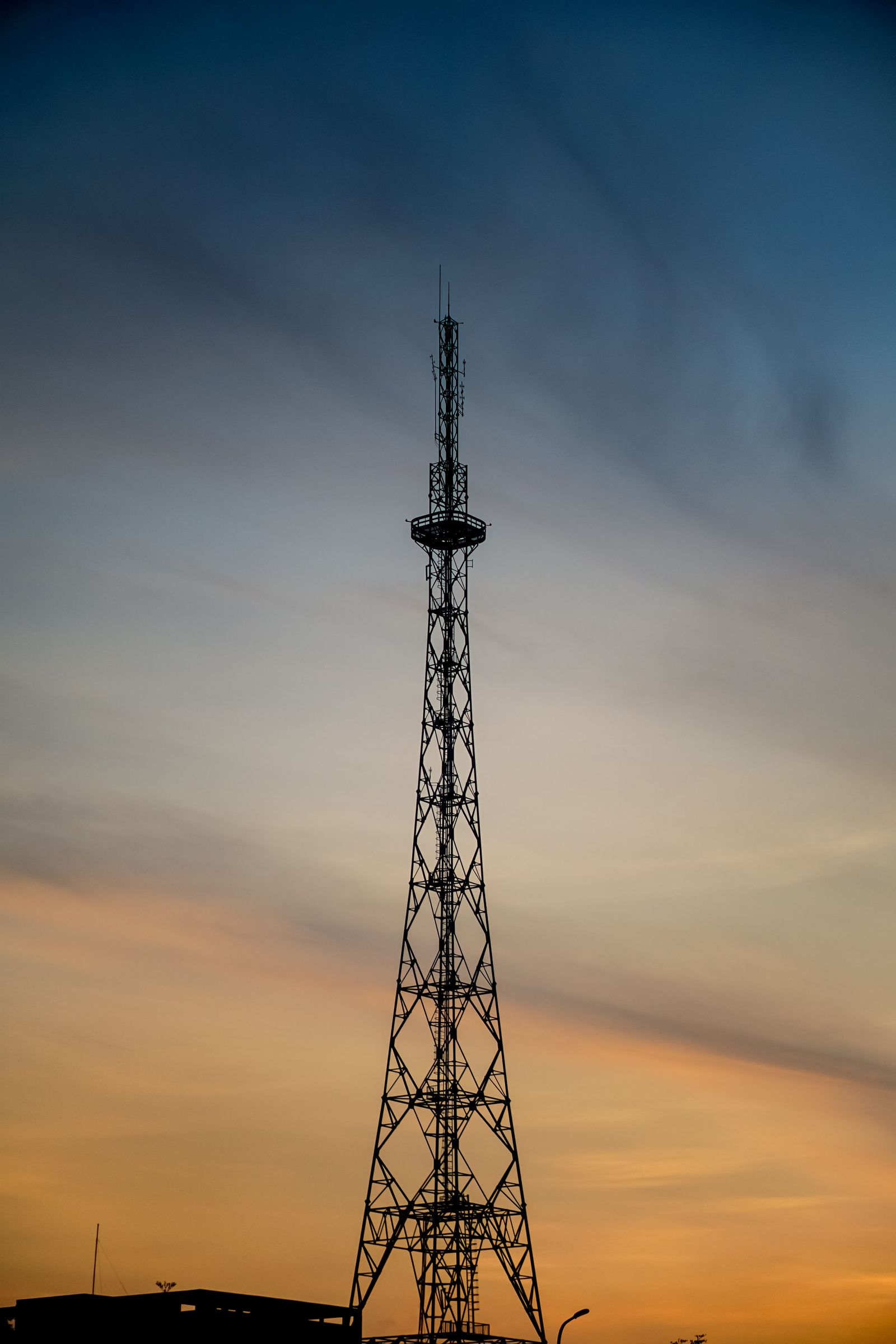 Silhouette of a Tower during Sunset · Free Stock Photo