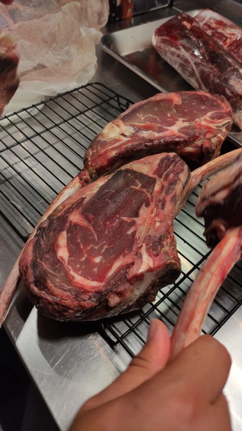 Free tomahawk steak Stock Photo