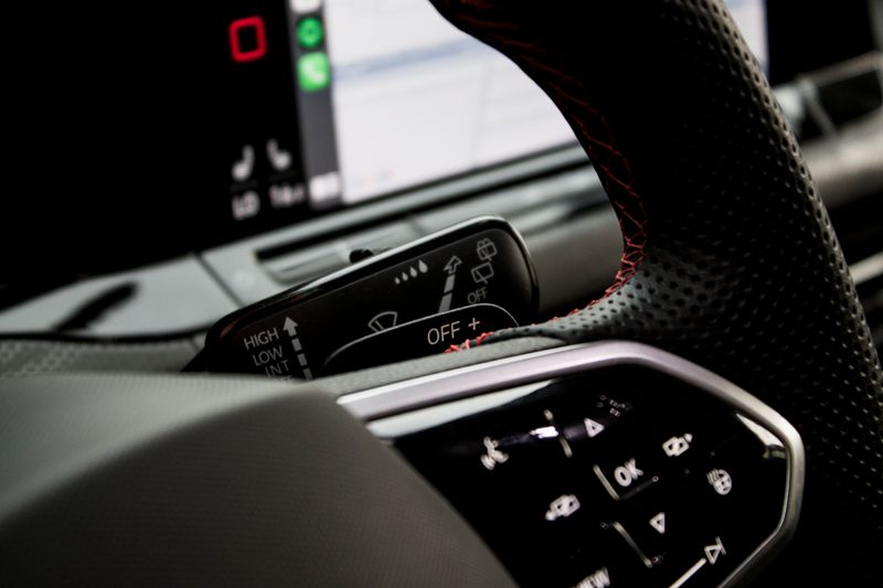Control Buttons on the Steering Wheel · Free Stock Photo