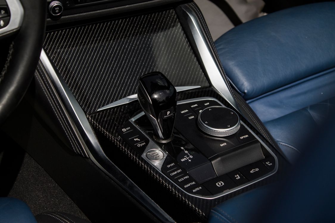 Luxury Car Interior with Carbon Fiber Gear Shift · Free Stock Photo