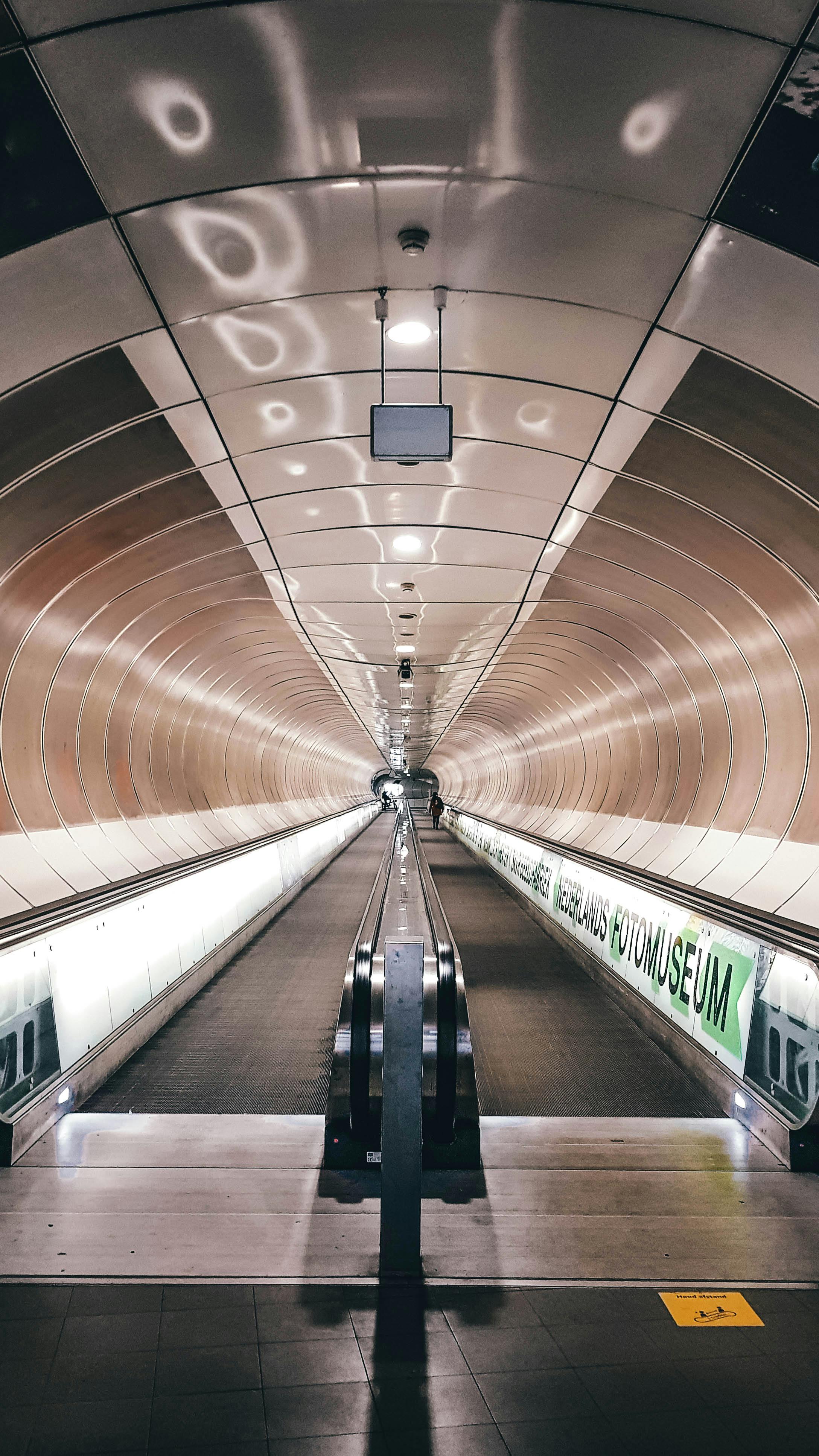 modern rotterdam metro tunnel escalator view