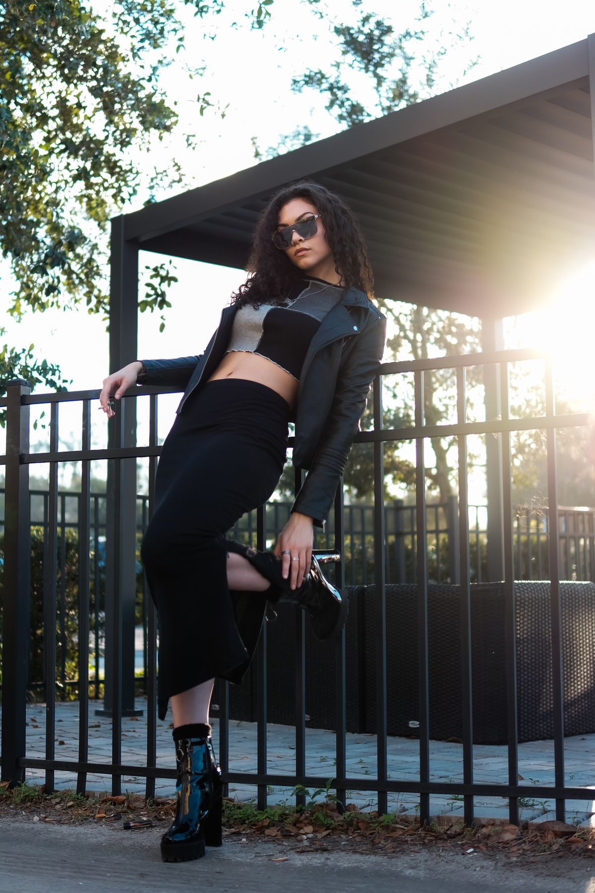 Stylish Woman Posing Outdoors in Leather Jacket · Free Stock Photo