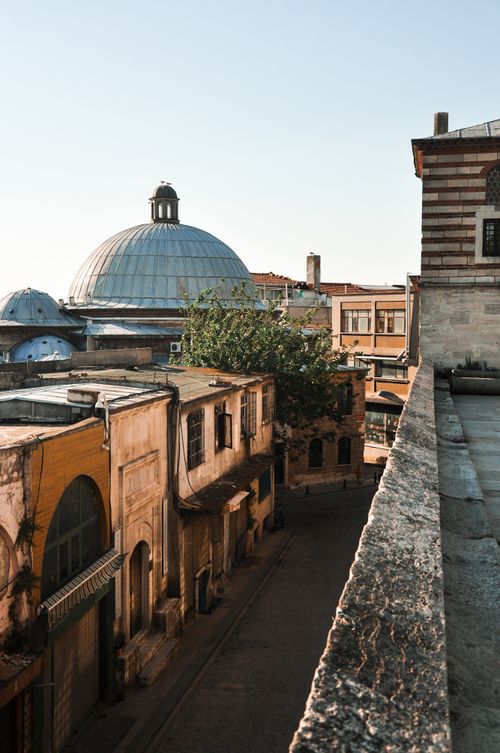 Free Beautiful view of historic buildings with a domed roof, capturing the charm of old architecture at sunset. Stock Photo