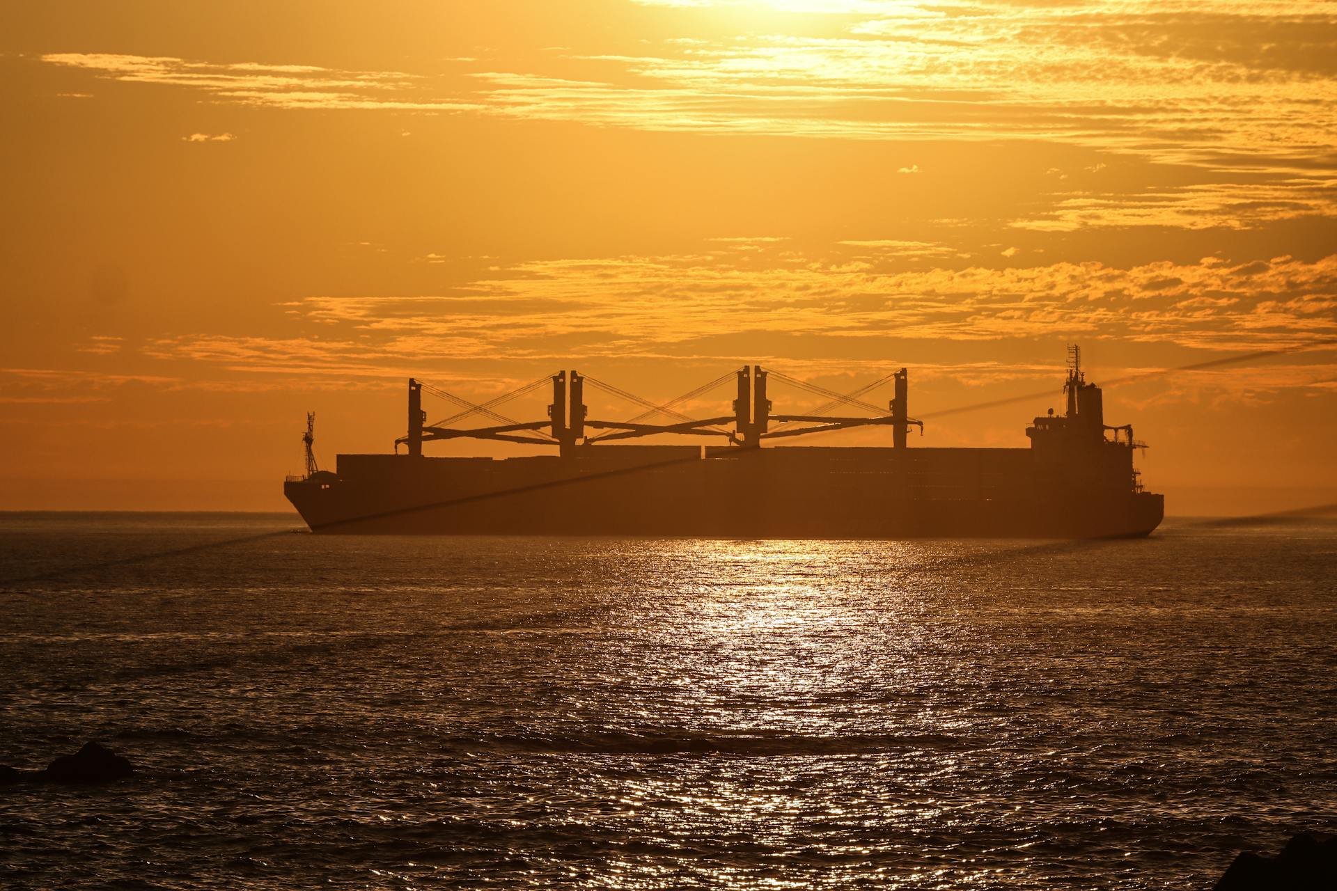 Cargo Ship Silhouette at Sunset in Matosinhos