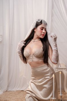 A captivating lingerie photoshoot showcasing elegant bridal fashion with delicate lace details.