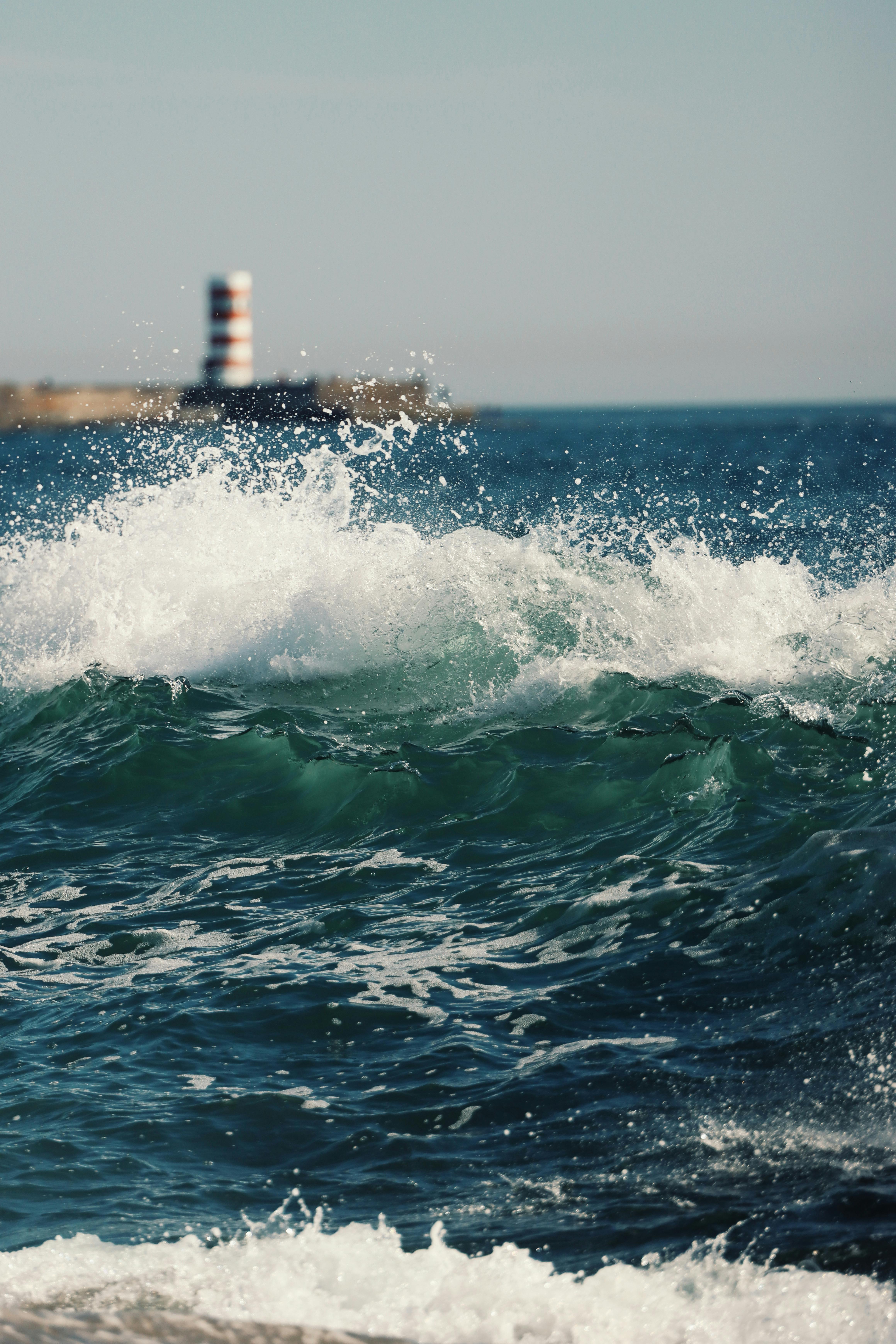 dramatic atlantic waves and iconic matosinhos lighthouse