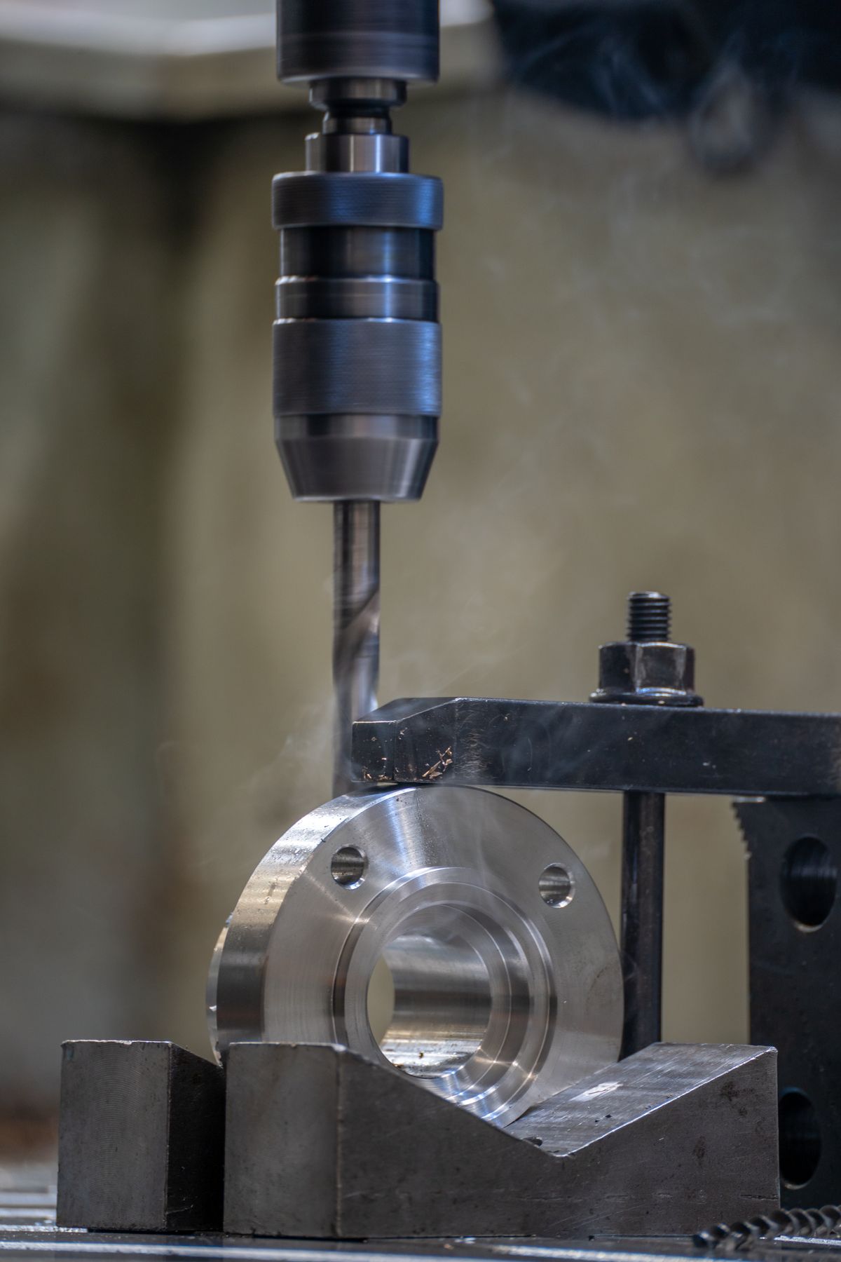 Metal drilling process in an industrial workshop
