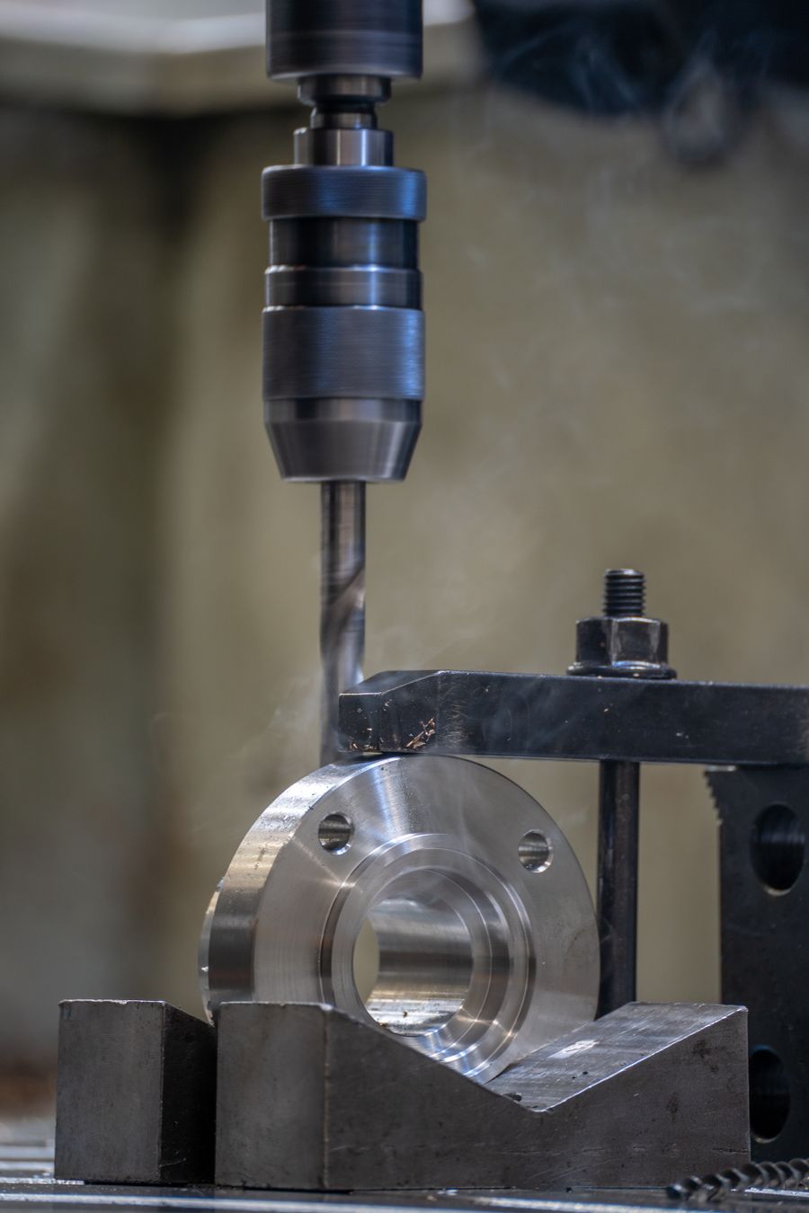 Metal drilling process in an industrial workshop
